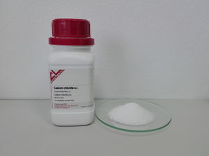 Caesium chloride bottle and sample.jpg