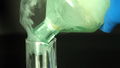 Liquid oleum poured in a beaker by ChemicalForce.jpg