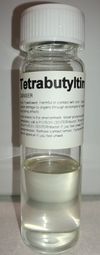 Tetrabutyltin compound in glass bottle.jpeg