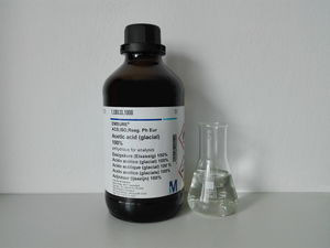 Acetic acid glacial bottle and sample.jpg